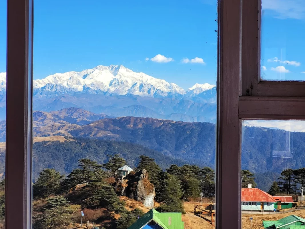 View of Snow Clad Khangchendzonga from the hotel in SetMyTrip's Sandakphu Tour Package