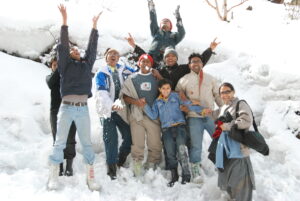 Family Enjoying Snow at Katao Pass: Sikkim Snow Packages