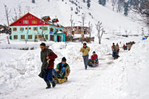 Experience Sledding on the pristine snow in the curated Kashmir Winter Tour Packages by SetMyTrip