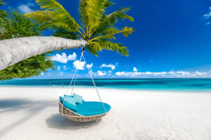 Bangaram Tropical beach summer landscape with beach swing or hammock and white sand and calm sea